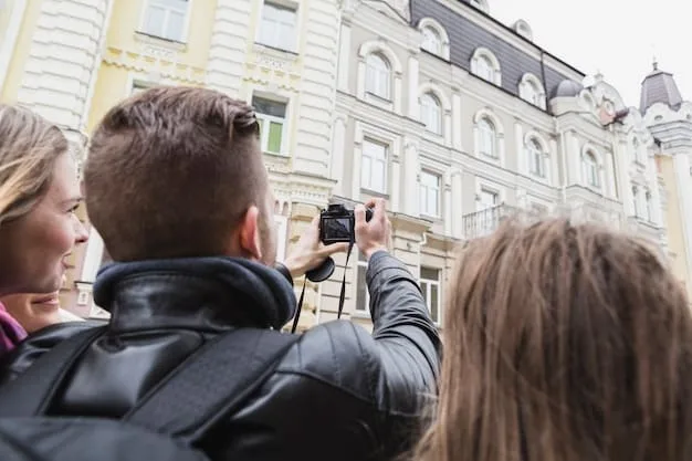 A street photographer in action, blending into an urban crowd, capturing candid shots with a prime lens, exemplifying discreet photography.
