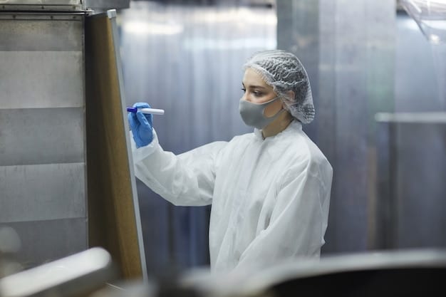 A scientist in a lab coat precisely applying a transparent liquid coating to a small section of a test mural, with advanced lab equipment in the background.