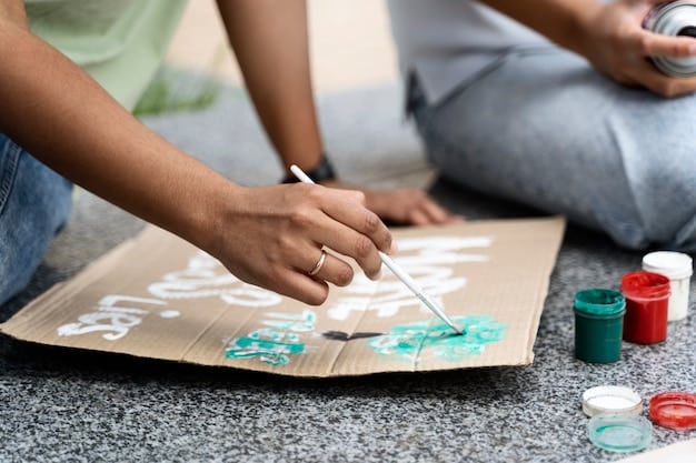 A diverse group of community members, including children and adults, collaboratively painting a section of a large mural, guided by an artist, emphasizing community involvement and diverse representation.