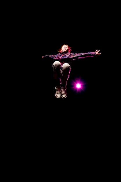 A dynamic shot of a hip hop dancer performing a gravity-defying power move during an international battle, surrounded by an energetic crowd and vibrant stage lights.