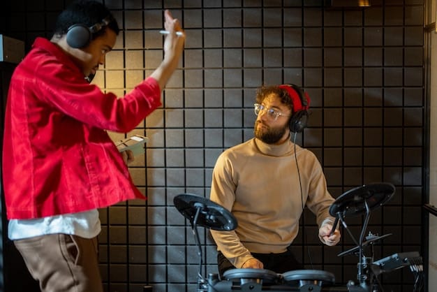 Two US rap artists collaborating in a well-lit, modern music studio. They are actively engaged in a creative discussion, surrounded by musical instruments and recording equipment. The atmosphere is collaborative and energetic.