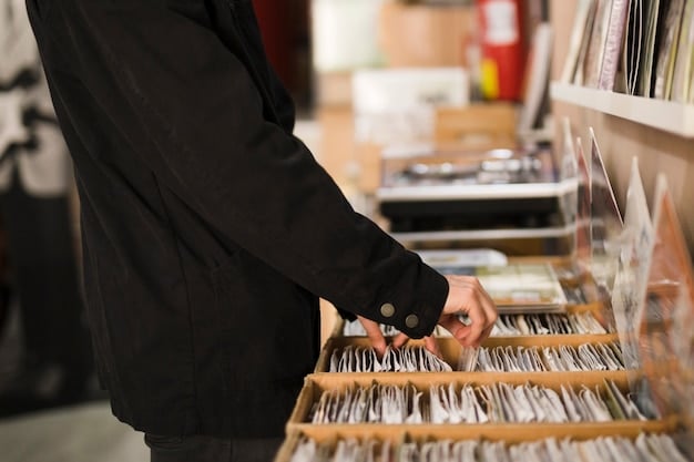 A close-up shot of vinyl records displayed in a record store, with a variety of independent label releases visible.