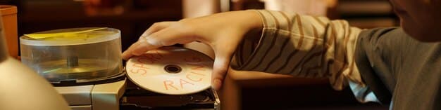 A close-up shot of a person carefully examining vinyl records in a dimly lit record store, capturing the nostalgic and tactile process of discovering unique samples.