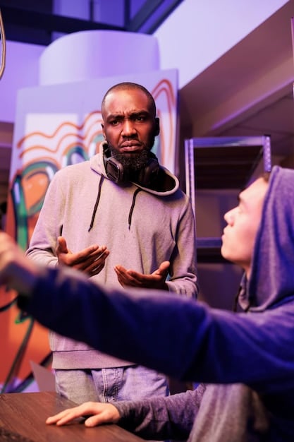 A close-up shot of a leader in an underground rap collective, passionately addressing their group in a meeting, with a whiteboard filled with strategic plans in the background.
