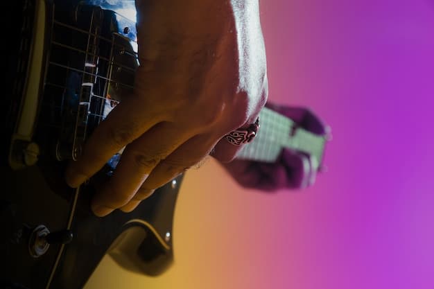 A close-up of a musician's foot pressing a live loop pedal on a dimly lit stage, with light trails suggesting movement and dynamic performance in a vibrant live music venue.