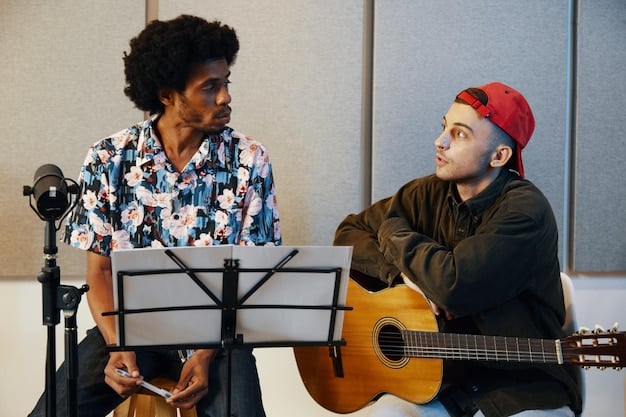 Two musicians, one on keyboard and one on guitar, seated in a recording studio, deep in conversation and creative discussion, a whiteboard with ideas behind them.