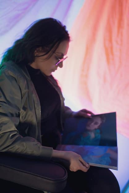 An underground musician looking contemplatively at a laptop screen displaying a blockchain network diagram overlaid with music waveforms, suggesting the integration of technology into their creative process.