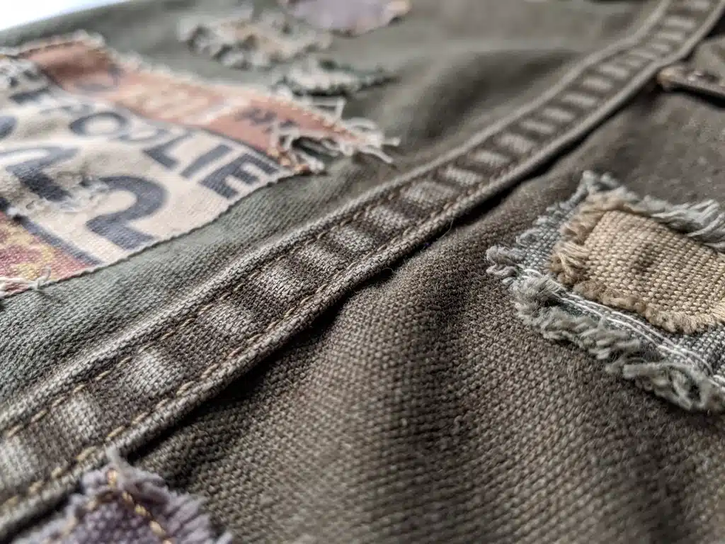 Close-up of upcycled canvas fabric texture and stitching details